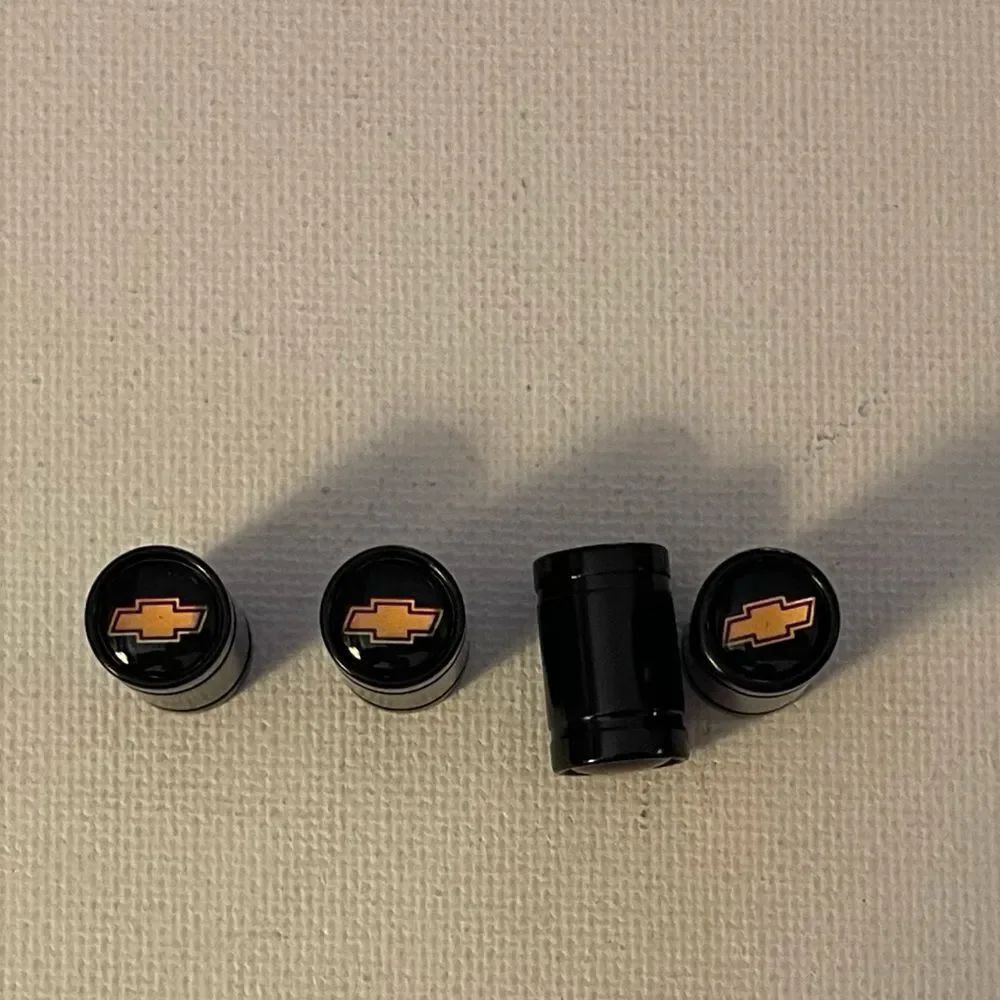 Chevrolet valve Stem caps in black set of 4 with Logo NWT